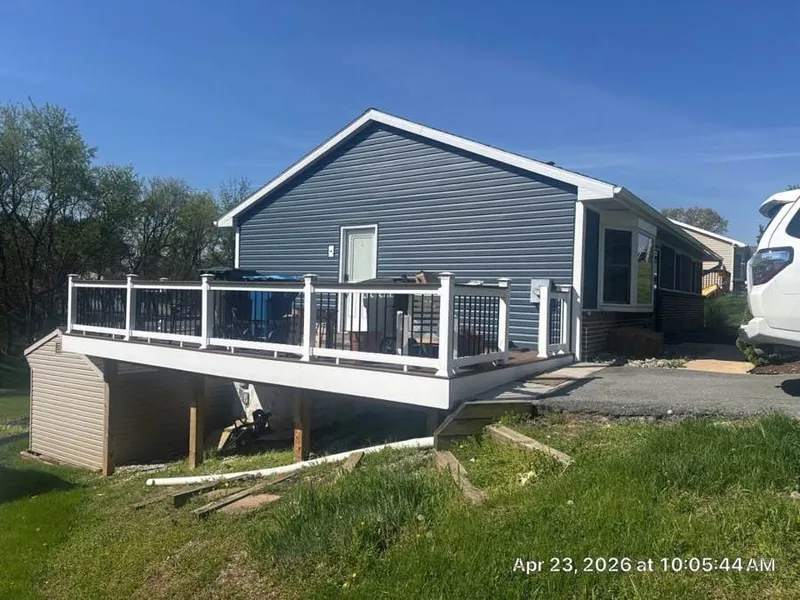 Blue James Hardie siding on a ranch home